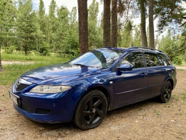 Синий Мазда 6, объемом двигателя 2 л и пробегом 285 тыс. км за 2950 $, фото 3 на Automoto.ua