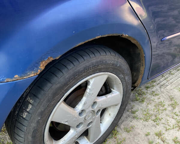 Синій Мазда 6, об'ємом двигуна 2 л та пробігом 220 тис. км за 3000 $, фото 6 на Automoto.ua