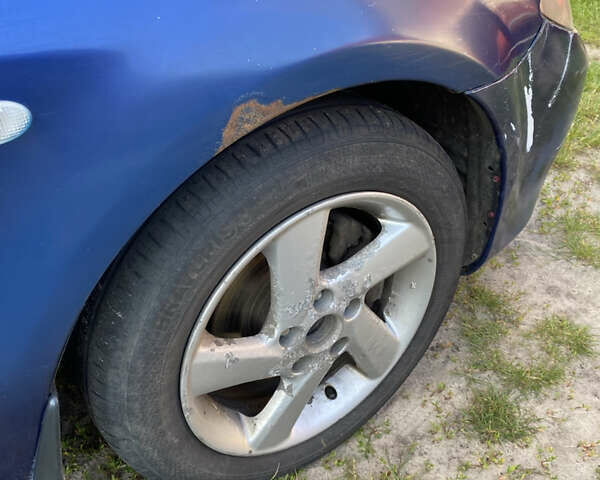 Синій Мазда 6, об'ємом двигуна 2 л та пробігом 220 тис. км за 3000 $, фото 7 на Automoto.ua