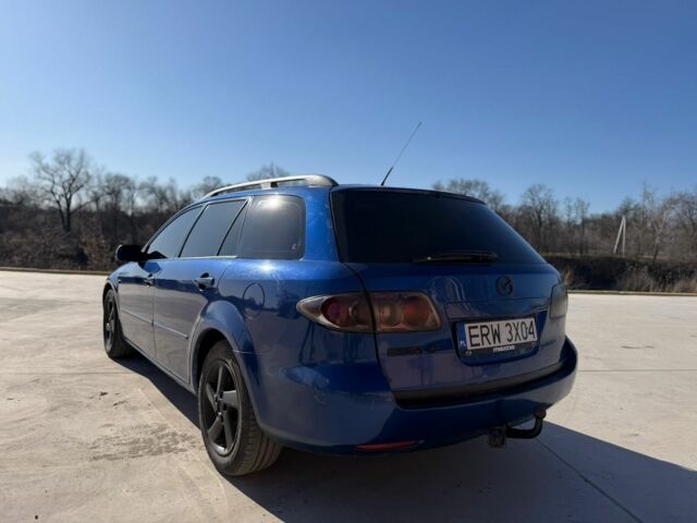 Синий Мазда 6, объемом двигателя 2 л и пробегом 270 тыс. км за 2350 $, фото 4 на Automoto.ua