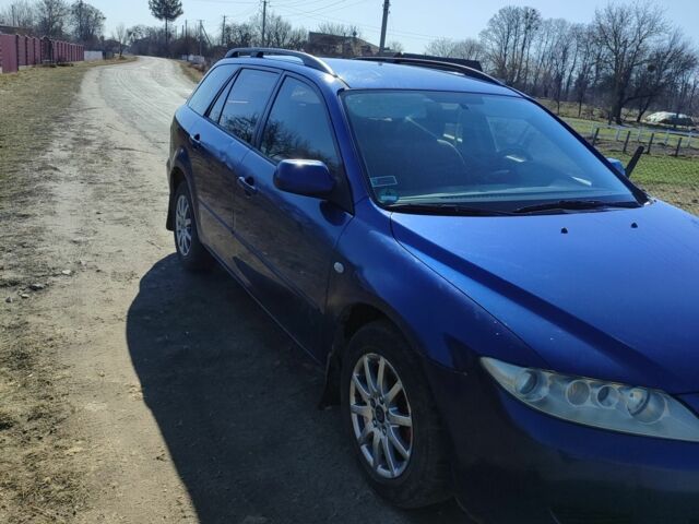 Синий Мазда 6, объемом двигателя 2 л и пробегом 348 тыс. км за 1400 $, фото 3 на Automoto.ua