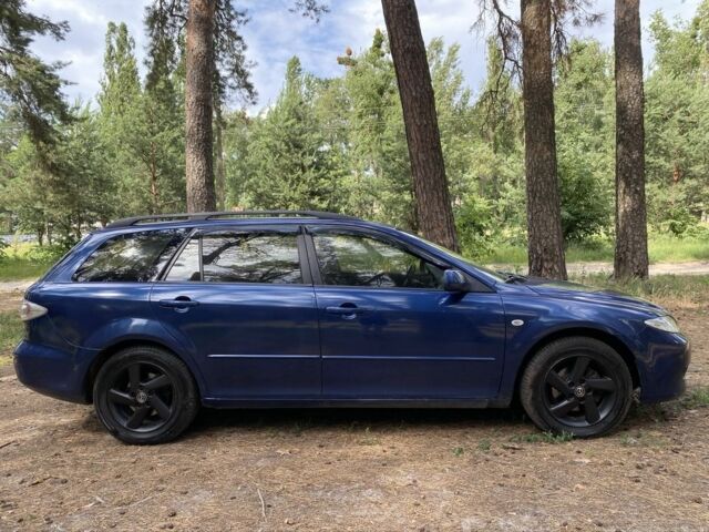 Синий Мазда 6, объемом двигателя 2 л и пробегом 285 тыс. км за 2950 $, фото 1 на Automoto.ua
