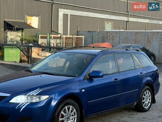 Синий Мазда 6, объемом двигателя 2 л и пробегом 349 тыс. км за 1600 $, фото 4 на Automoto.ua