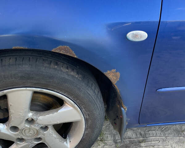 Синій Мазда 6, об'ємом двигуна 2 л та пробігом 220 тис. км за 3000 $, фото 4 на Automoto.ua