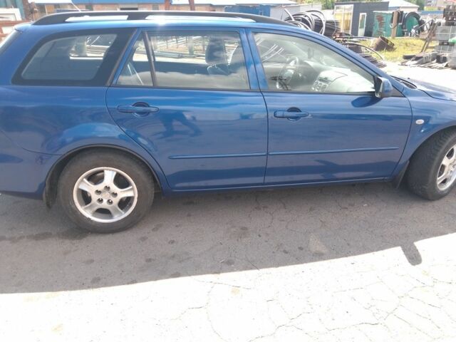 Синий Мазда 6, объемом двигателя 2 л и пробегом 75 тыс. км за 3960 $, фото 3 на Automoto.ua