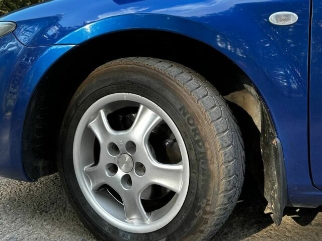 Синій Мазда 6, об'ємом двигуна 2 л та пробігом 315 тис. км за 3649 $, фото 4 на Automoto.ua