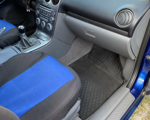 Синій Мазда 6, об'ємом двигуна 2 л та пробігом 220 тис. км за 3000 $, фото 8 на Automoto.ua