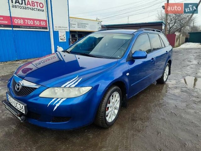 Синій Мазда 6, об'ємом двигуна 2 л та пробігом 348 тис. км за 1700 $, фото 1 на Automoto.ua