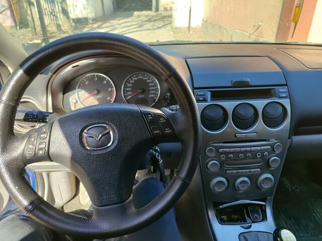 Синий Мазда 6, объемом двигателя 2 л и пробегом 348 тыс. км за 1600 $, фото 7 на Automoto.ua