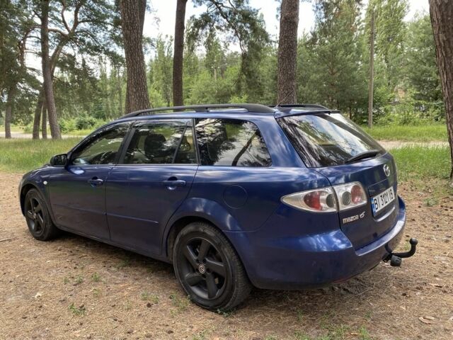 Синий Мазда 6, объемом двигателя 2 л и пробегом 285 тыс. км за 2950 $, фото 4 на Automoto.ua