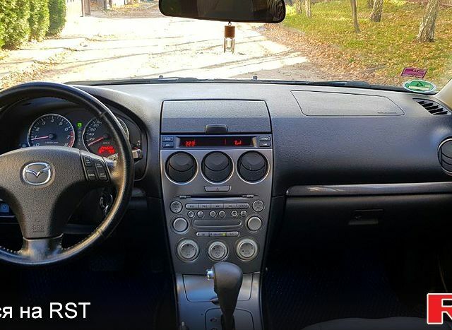 Синий Мазда 6, объемом двигателя 2 л и пробегом 274 тыс. км за 4400 $, фото 6 на Automoto.ua