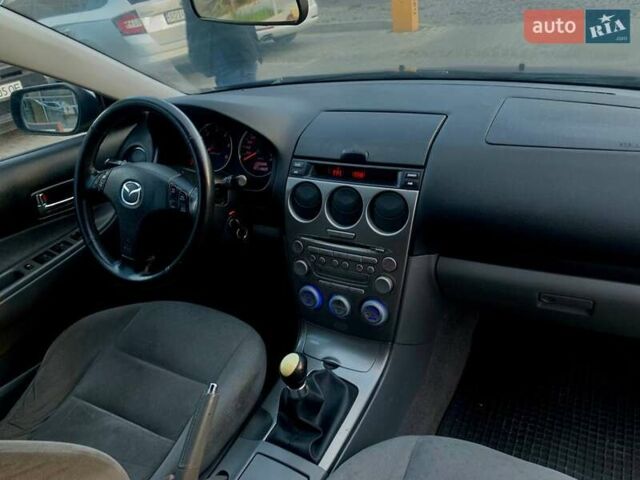 Синій Мазда 6, об'ємом двигуна 2 л та пробігом 108 тис. км за 4500 $, фото 1 на Automoto.ua