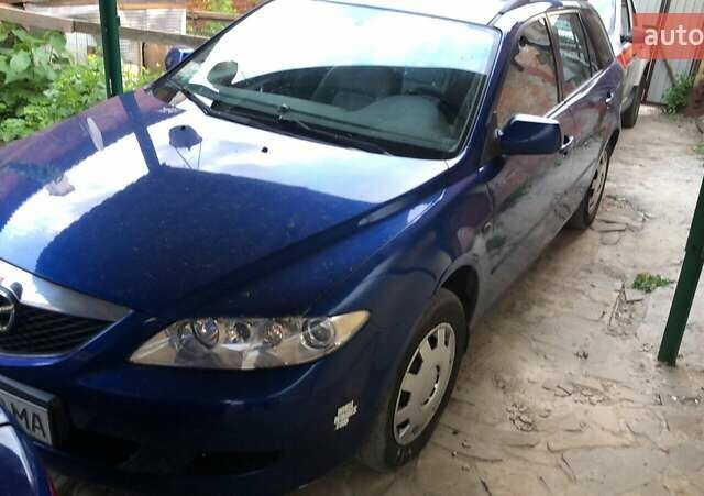 Синий Мазда 6, объемом двигателя 2 л и пробегом 215 тыс. км за 4000 $, фото 1 на Automoto.ua