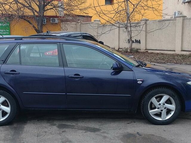 Синий Мазда 6, объемом двигателя 2 л и пробегом 300 тыс. км за 3900 $, фото 3 на Automoto.ua