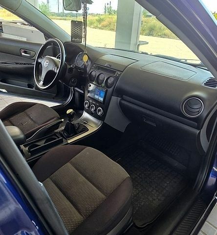 Синий Мазда 6, объемом двигателя 2 л и пробегом 341 тыс. км за 3600 $, фото 9 на Automoto.ua