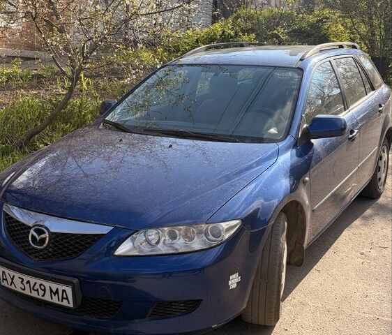 Синий Мазда 6, объемом двигателя 2 л и пробегом 209 тыс. км за 3200 $, фото 1 на Automoto.ua