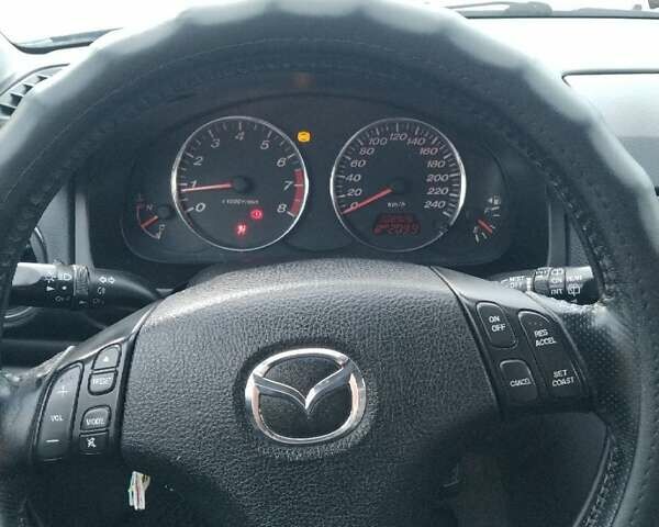 Синий Мазда 6, объемом двигателя 1.8 л и пробегом 310 тыс. км за 2900 $, фото 5 на Automoto.ua