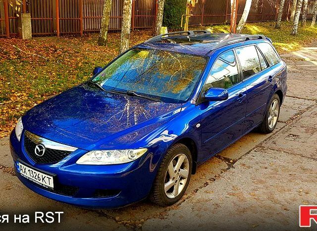 Синий Мазда 6, объемом двигателя 2 л и пробегом 274 тыс. км за 4400 $, фото 2 на Automoto.ua