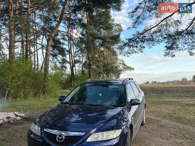 Синий Мазда 6, объемом двигателя 2 л и пробегом 410 тыс. км за 4100 $, фото 2 на Automoto.ua