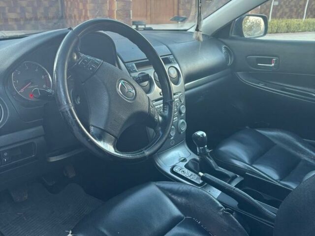 Синий Мазда 6, объемом двигателя 2 л и пробегом 420 тыс. км за 1252 $, фото 2 на Automoto.ua