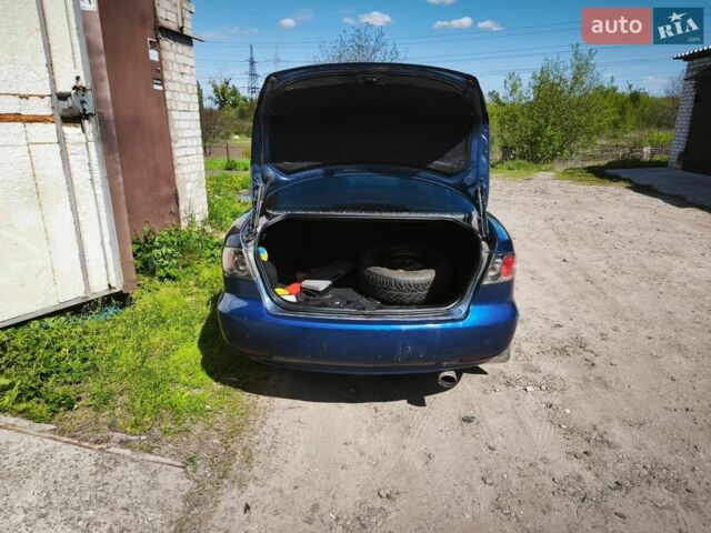 Синий Мазда 6, объемом двигателя 2 л и пробегом 270 тыс. км за 4000 $, фото 2 на Automoto.ua