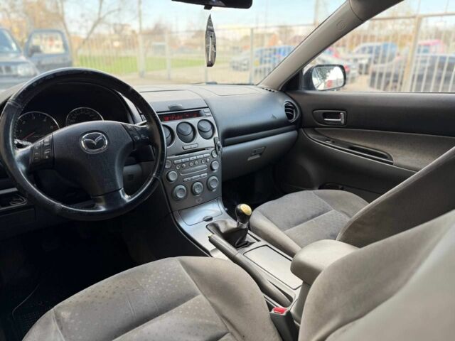 Синий Мазда 6, объемом двигателя 2.2 л и пробегом 355 тыс. км за 1299 $, фото 4 на Automoto.ua
