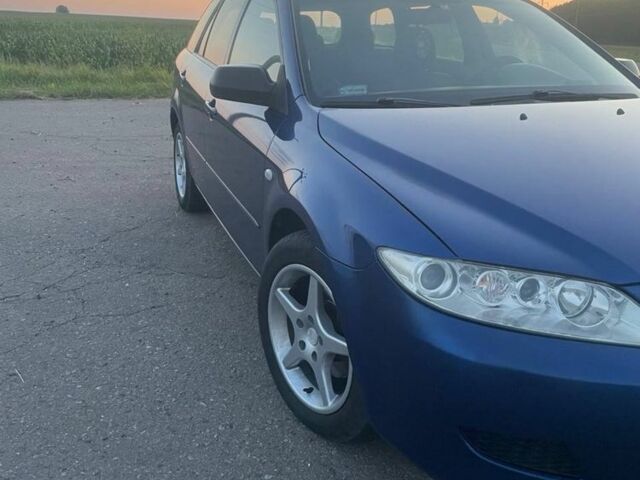 Синий Мазда 6, объемом двигателя 1.8 л и пробегом 360 тыс. км за 2909 $, фото 2 на Automoto.ua
