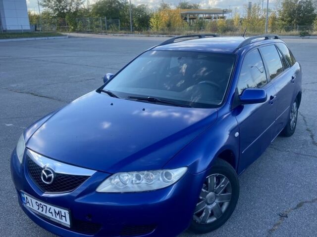 Синий Мазда 6, объемом двигателя 2 л и пробегом 350 тыс. км за 1999 $, фото 2 на Automoto.ua