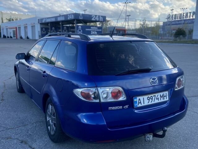 Синий Мазда 6, объемом двигателя 2 л и пробегом 350 тыс. км за 1999 $, фото 4 на Automoto.ua