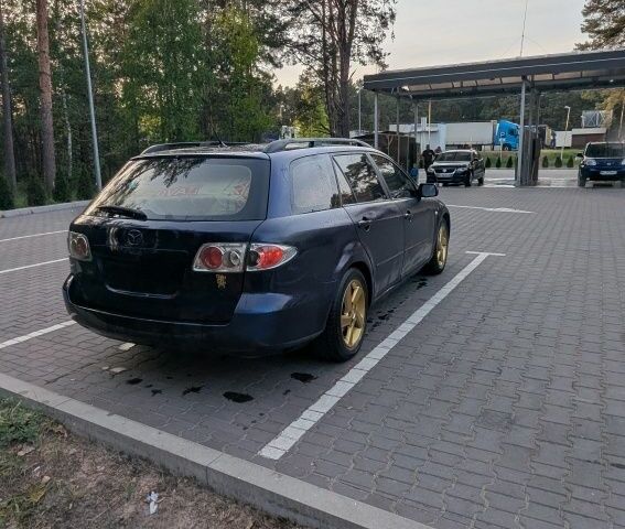Синий Мазда 6, объемом двигателя 2 л и пробегом 380 тыс. км за 2700 $, фото 1 на Automoto.ua