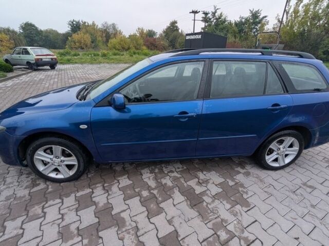 Синій Мазда 6, об'ємом двигуна 2 л та пробігом 320 тис. км за 3850 $, фото 3 на Automoto.ua