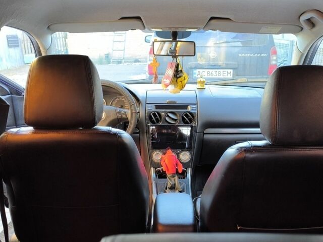 Синій Мазда 6, об'ємом двигуна 2 л та пробігом 321 тис. км за 5300 $, фото 2 на Automoto.ua