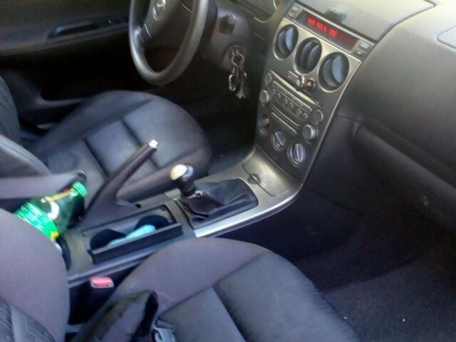 Синий Мазда 6, объемом двигателя 2 л и пробегом 250 тыс. км за 4200 $, фото 4 на Automoto.ua