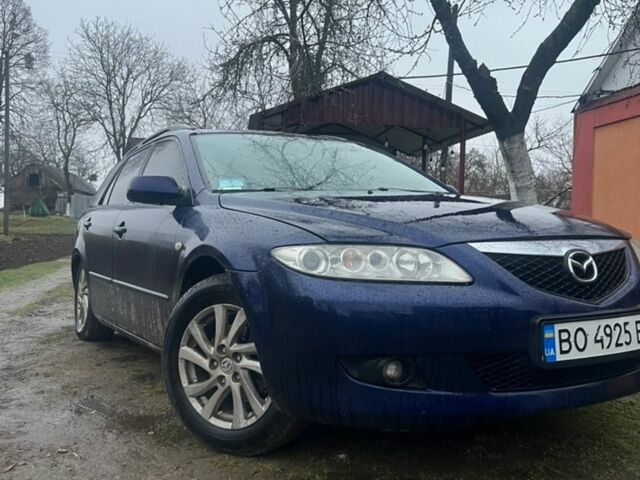 Синий Мазда 6, объемом двигателя 2 л и пробегом 410 тыс. км за 4100 $, фото 5 на Automoto.ua