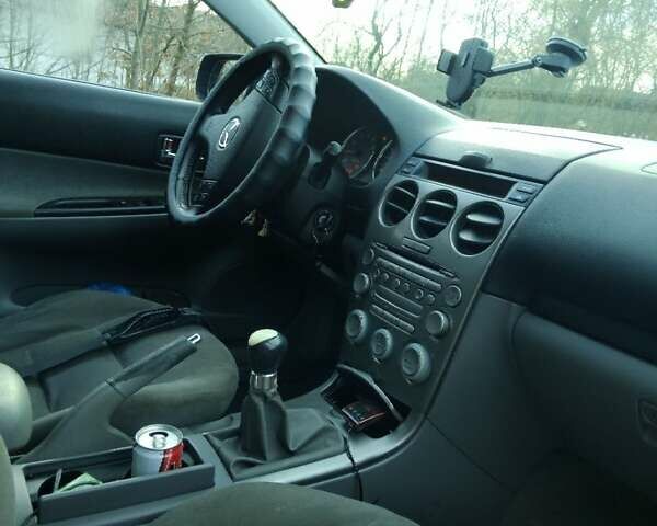 Синий Мазда 6, объемом двигателя 1.8 л и пробегом 310 тыс. км за 2900 $, фото 7 на Automoto.ua