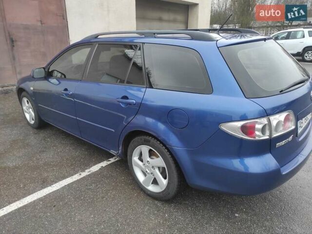 Синій Мазда 6, об'ємом двигуна 1.8 л та пробігом 285 тис. км за 3750 $, фото 6 на Automoto.ua