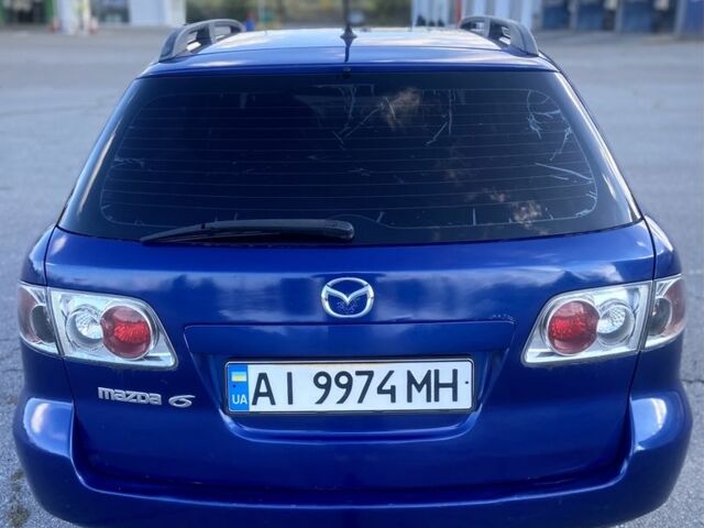Синий Мазда 6, объемом двигателя 2 л и пробегом 350 тыс. км за 1999 $, фото 5 на Automoto.ua