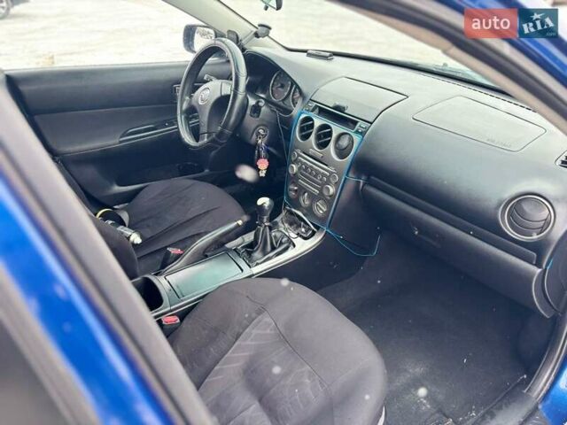 Синий Мазда 6, объемом двигателя 1.8 л и пробегом 370 тыс. км за 1500 $, фото 17 на Automoto.ua