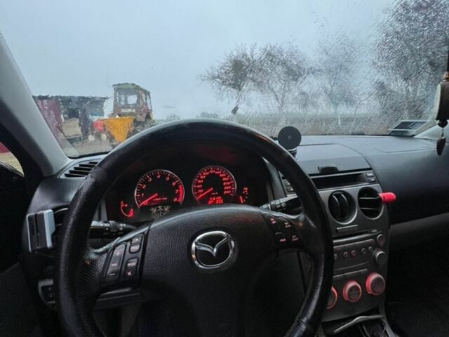 Синий Мазда 6, объемом двигателя 2 л и пробегом 410 тыс. км за 4100 $, фото 21 на Automoto.ua