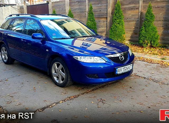 Синий Мазда 6, объемом двигателя 2 л и пробегом 274 тыс. км за 4400 $, фото 1 на Automoto.ua
