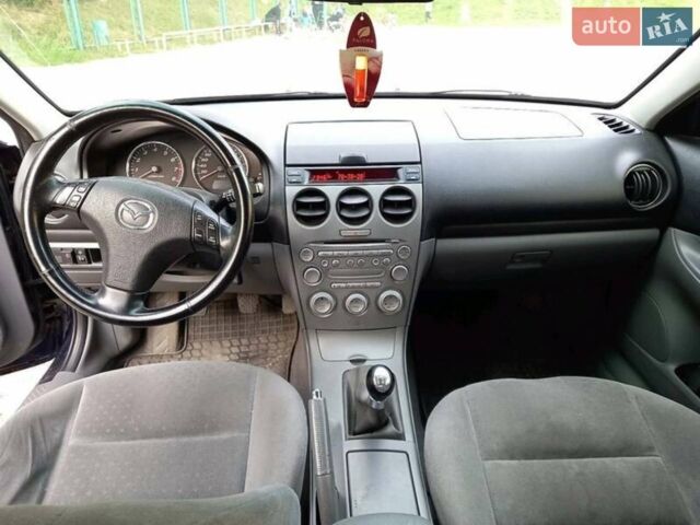 Синий Мазда 6, объемом двигателя 1.8 л и пробегом 295 тыс. км за 4100 $, фото 2 на Automoto.ua