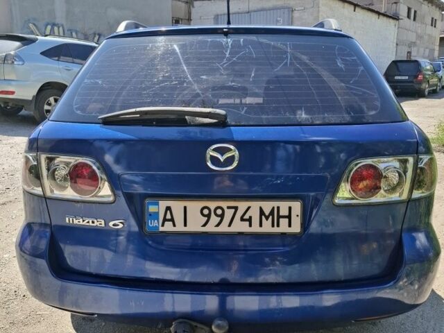 Синий Мазда 6, объемом двигателя 2 л и пробегом 376 тыс. км за 3200 $, фото 2 на Automoto.ua
