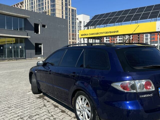 Синий Мазда 6, объемом двигателя 2 л и пробегом 417 тыс. км за 4050 $, фото 5 на Automoto.ua