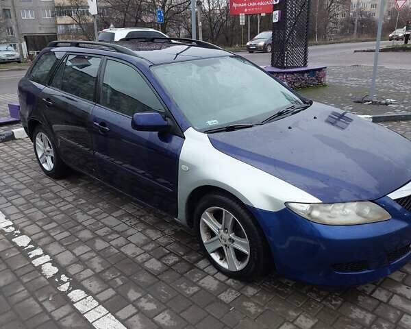 Синій Мазда 6, об'ємом двигуна 2 л та пробігом 230 тис. км за 1777 $, фото 5 на Automoto.ua