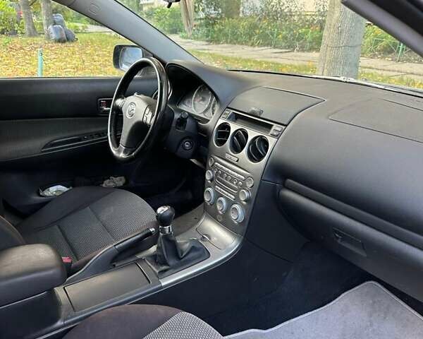 Мазда 6 2004 в Киеве на Automoto.ua Синий Мазда 6, объемом двигателя 2 л и пробегом 216 тыс. км за 3500 $, фото 21 на Automoto.ua