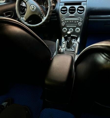Синий Мазда 6, объемом двигателя 2 л и пробегом 301 тыс. км за 3700 $, фото 5 на Automoto.ua