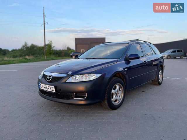 Синий Мазда 6, объемом двигателя 2 л и пробегом 243 тыс. км за 2399 $, фото 3 на Automoto.ua
