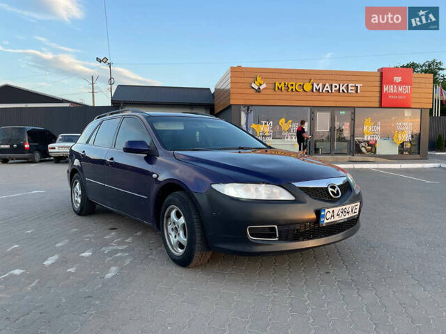 Синий Мазда 6, объемом двигателя 2 л и пробегом 243 тыс. км за 2399 $, фото 2 на Automoto.ua