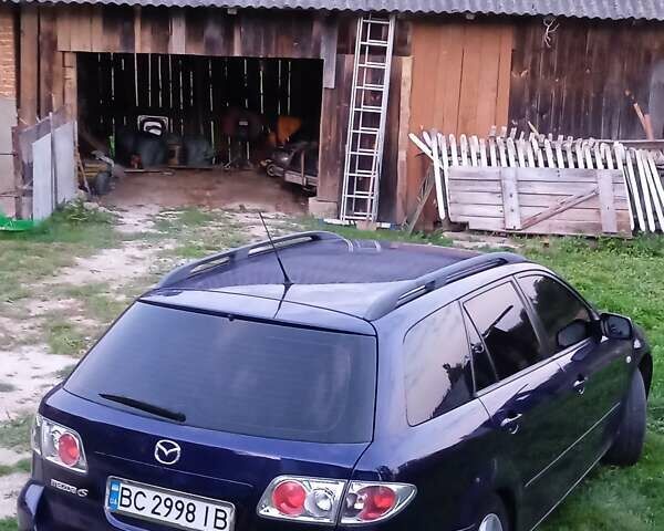 Синий Мазда 6, объемом двигателя 2 л и пробегом 218 тыс. км за 3800 $, фото 4 на Automoto.ua