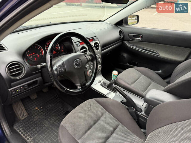 Синій Мазда 6, об'ємом двигуна 2 л та пробігом 230 тис. км за 4500 $, фото 7 на Automoto.ua